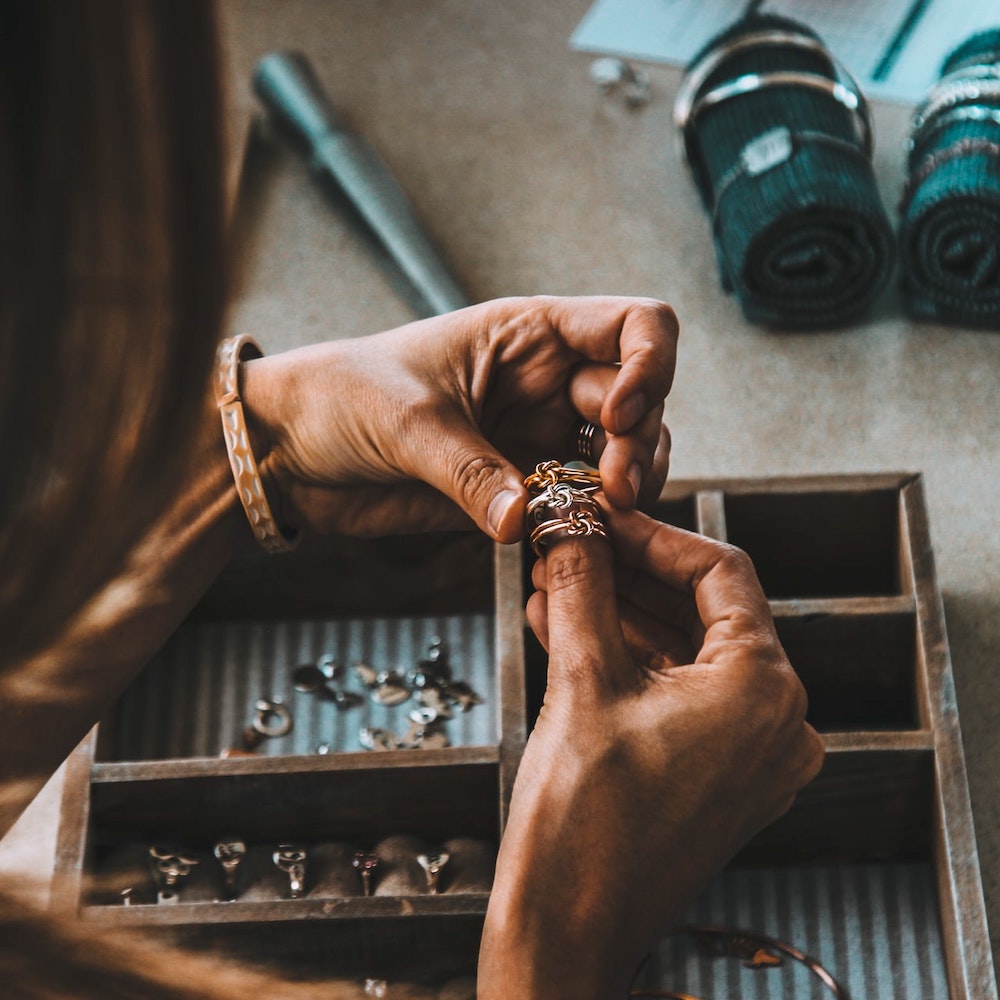 Jeweller handling rings
 